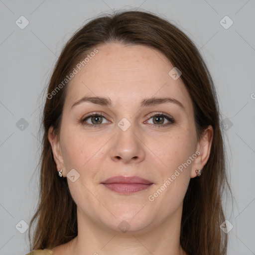 Joyful white adult female with medium  brown hair and grey eyes