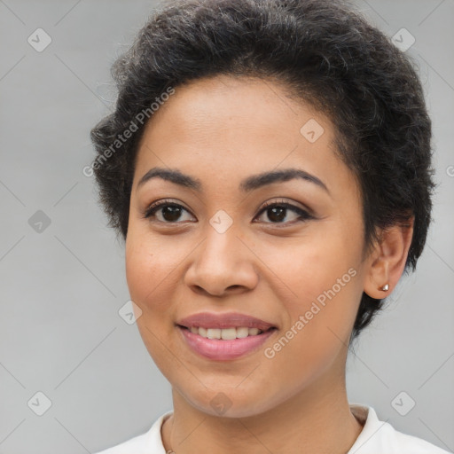 Joyful latino young-adult female with short  brown hair and brown eyes