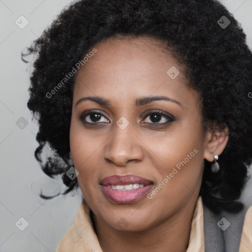 Joyful black young-adult female with long  brown hair and brown eyes