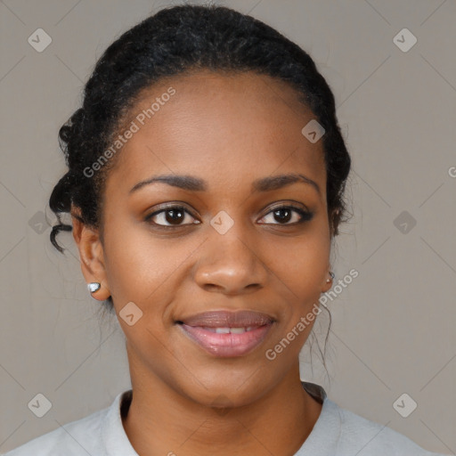 Joyful black young-adult female with medium  black hair and brown eyes