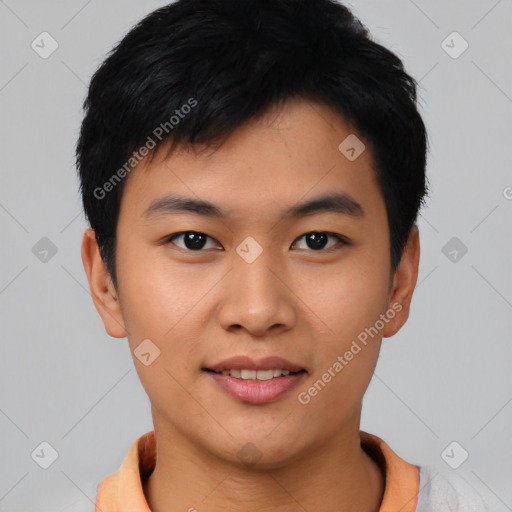 Joyful asian young-adult male with short  black hair and brown eyes