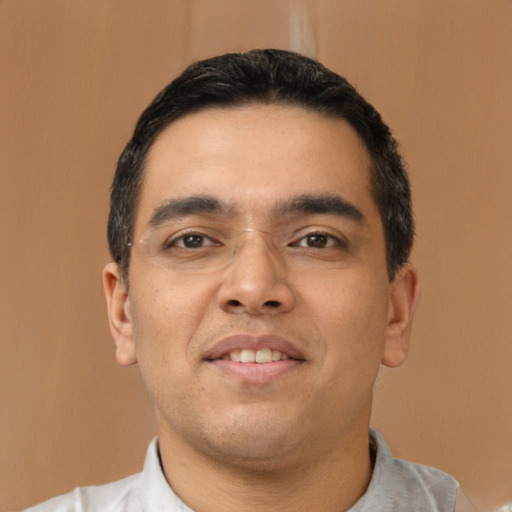 Neutral latino young-adult male with short  brown hair and brown eyes