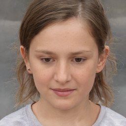 Joyful white child female with medium  brown hair and brown eyes