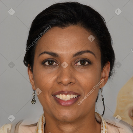 Joyful latino young-adult female with medium  brown hair and brown eyes