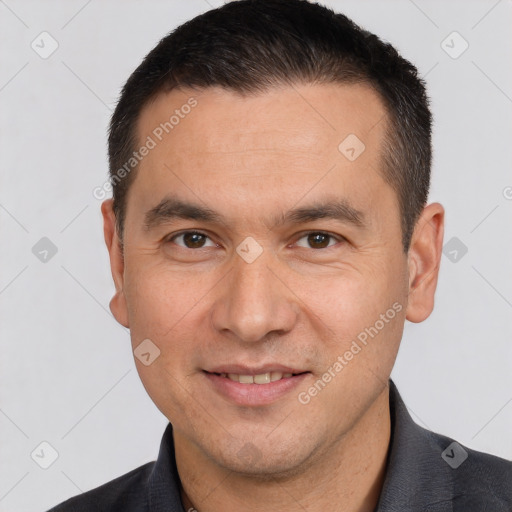 Joyful white adult male with short  brown hair and brown eyes