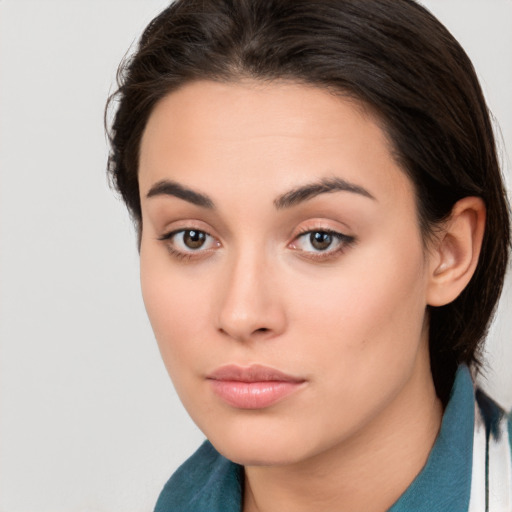 Neutral white young-adult female with medium  brown hair and brown eyes