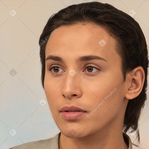 Neutral white young-adult female with medium  brown hair and brown eyes