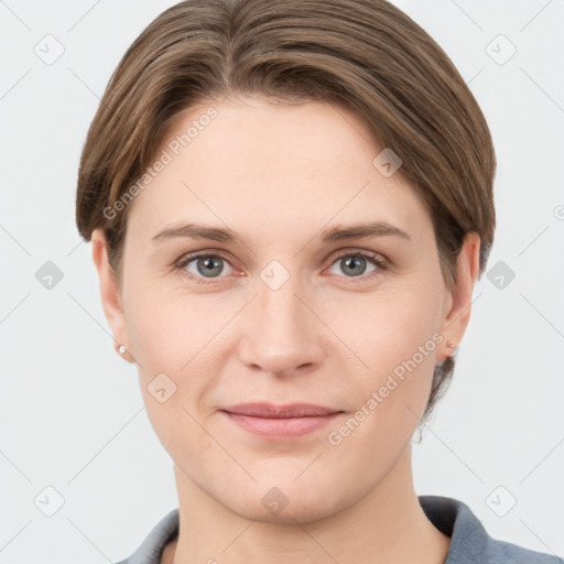 Joyful white young-adult female with short  brown hair and grey eyes