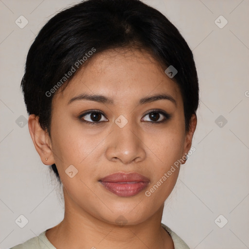 Joyful latino young-adult female with short  black hair and brown eyes