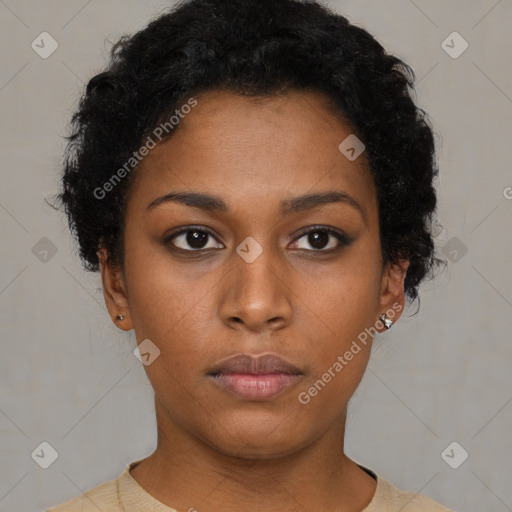 Neutral black young-adult female with short  brown hair and brown eyes