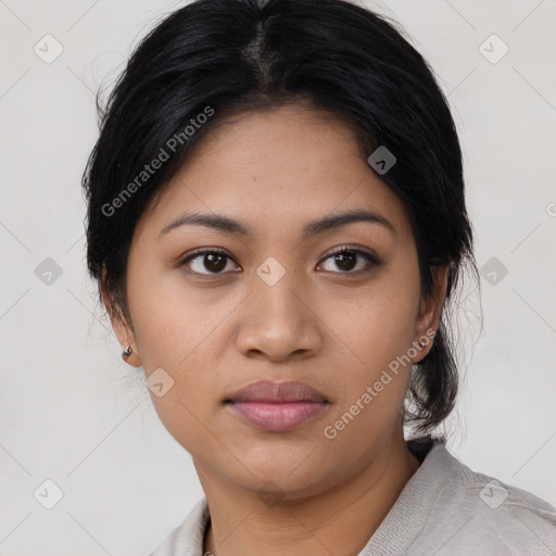 Joyful asian young-adult female with medium  black hair and brown eyes