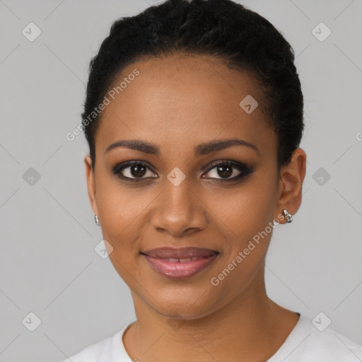 Joyful black young-adult female with short  black hair and brown eyes