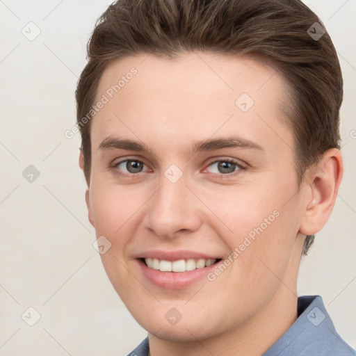 Joyful white young-adult female with short  brown hair and grey eyes