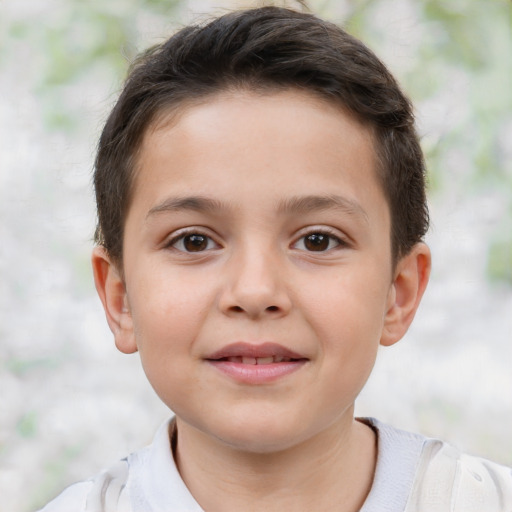 Joyful white child male with short  brown hair and brown eyes
