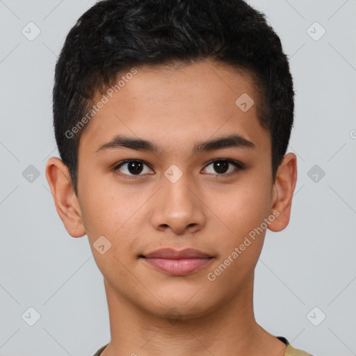 Joyful latino young-adult male with short  brown hair and brown eyes