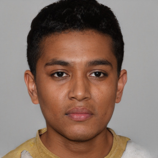 Neutral black young-adult male with short  black hair and brown eyes
