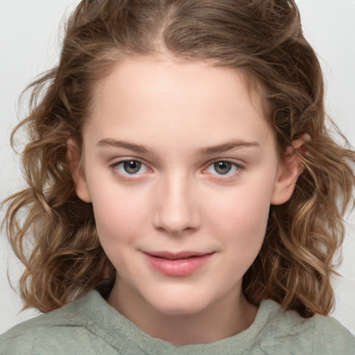 Joyful white child female with medium  brown hair and brown eyes