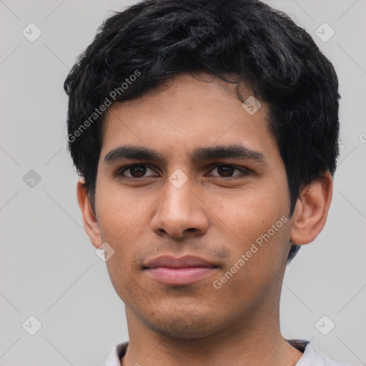 Neutral latino young-adult male with short  black hair and brown eyes