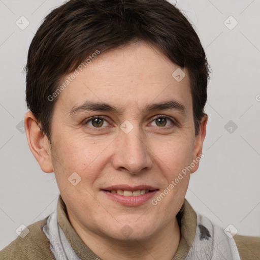 Joyful white adult female with short  brown hair and grey eyes