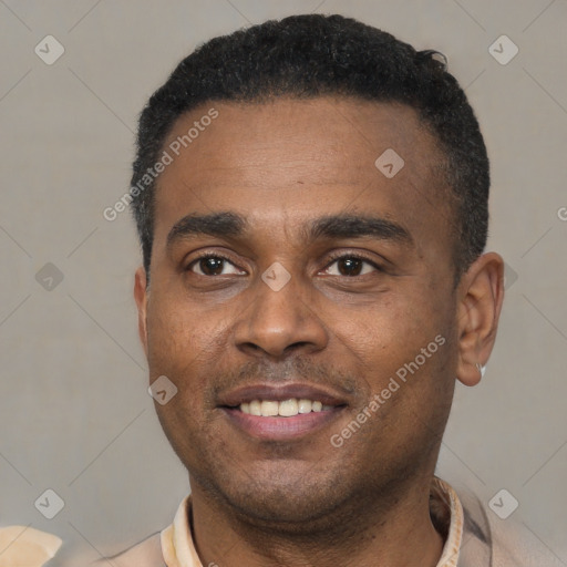 Joyful latino young-adult male with short  black hair and brown eyes