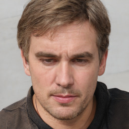 Neutral white adult male with short  brown hair and brown eyes