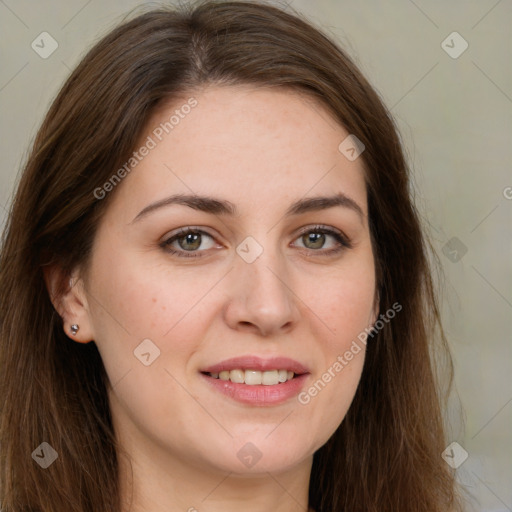 Joyful white young-adult female with long  brown hair and green eyes