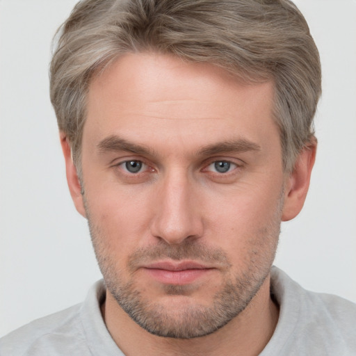 Neutral white adult male with short  brown hair and brown eyes