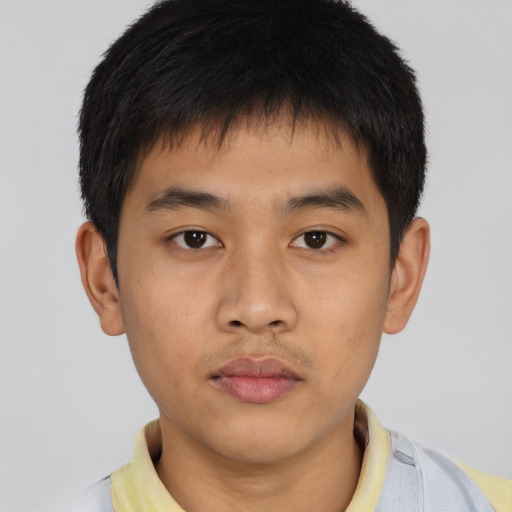 Neutral asian young-adult male with short  brown hair and brown eyes