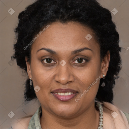 Joyful latino adult female with short  brown hair and brown eyes