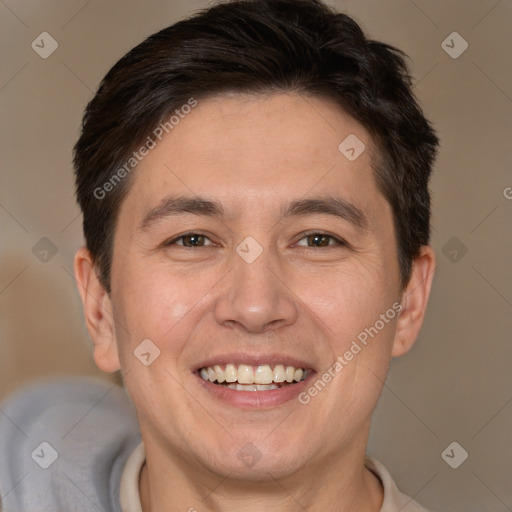 Joyful white adult male with short  brown hair and brown eyes