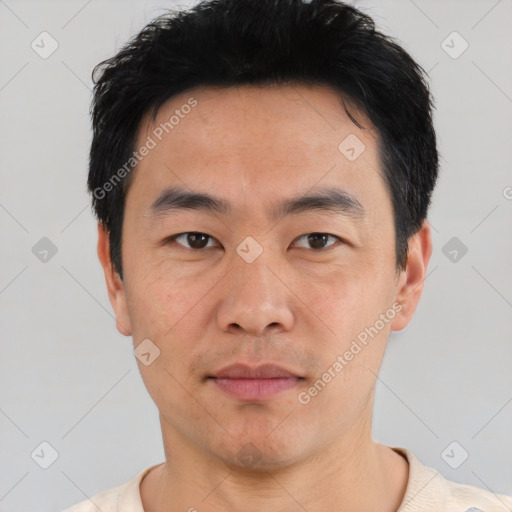 Neutral asian young-adult male with short  black hair and brown eyes