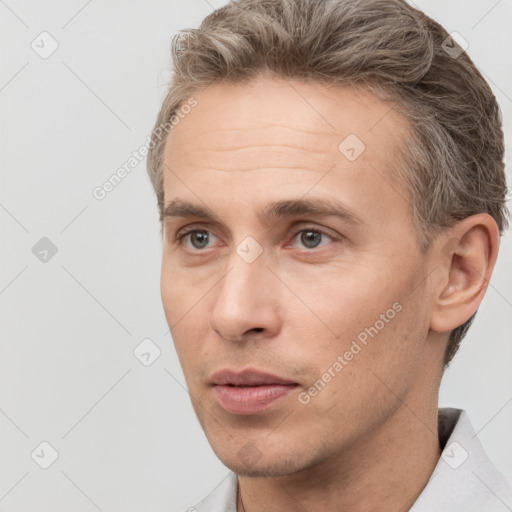 Neutral white adult male with short  brown hair and brown eyes