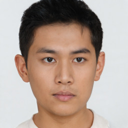 Neutral asian young-adult male with short  brown hair and brown eyes