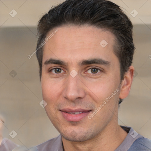 Joyful white adult male with short  brown hair and brown eyes