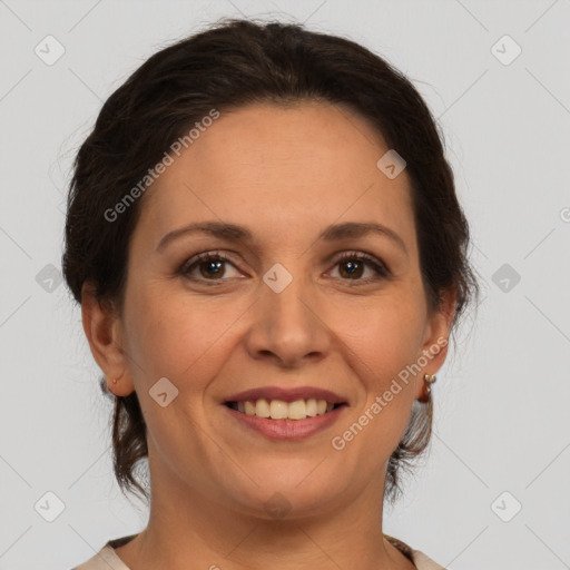 Joyful white adult female with medium  brown hair and brown eyes