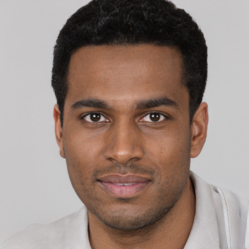 Neutral black young-adult male with short  black hair and brown eyes