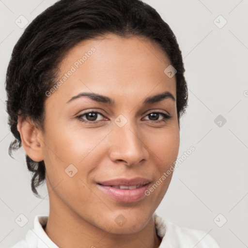 Joyful latino young-adult female with short  brown hair and brown eyes