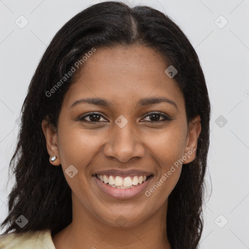 Joyful latino young-adult female with long  brown hair and brown eyes