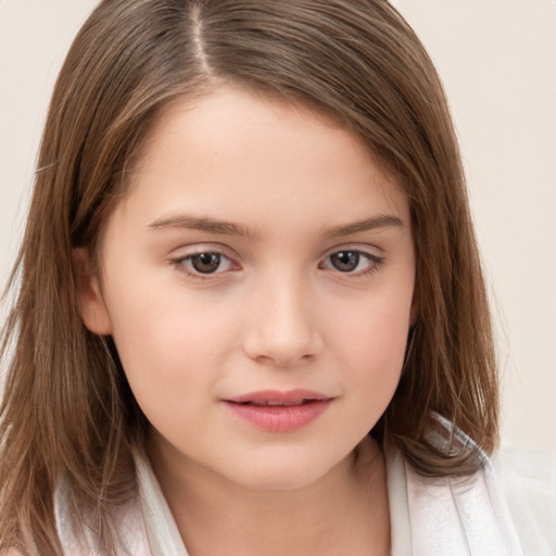 Joyful white child female with long  brown hair and brown eyes