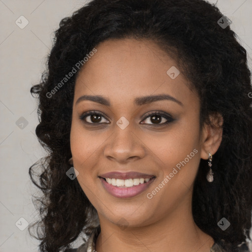 Joyful black young-adult female with long  brown hair and brown eyes