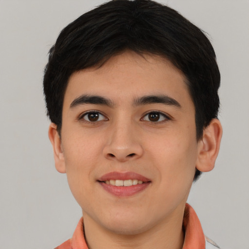 Joyful asian young-adult male with short  brown hair and brown eyes