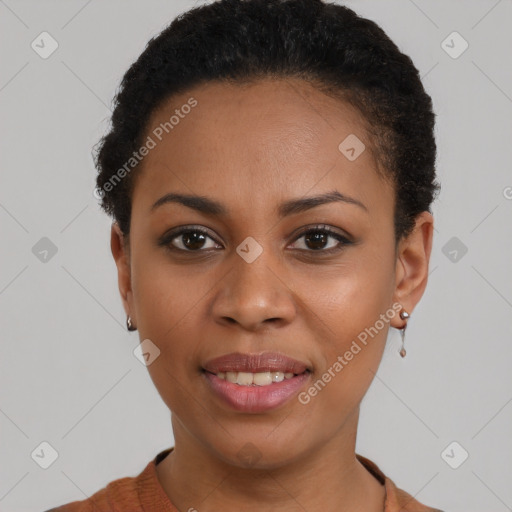 Joyful black young-adult female with short  brown hair and brown eyes