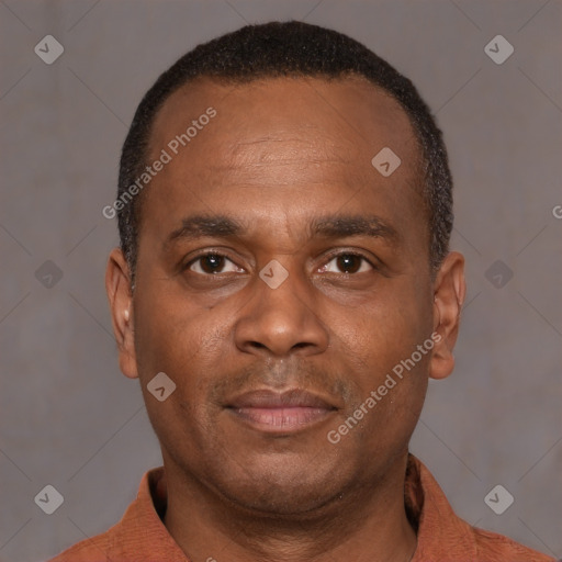 Neutral latino young-adult male with short  brown hair and brown eyes
