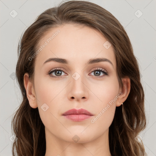 Neutral white young-adult female with long  brown hair and brown eyes