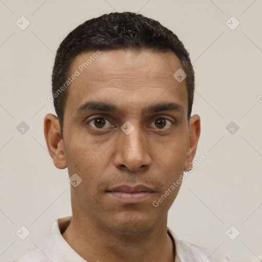 Neutral white young-adult male with short  black hair and brown eyes