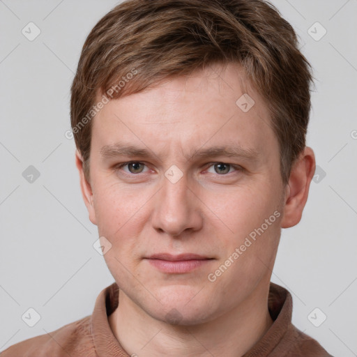 Neutral white young-adult male with short  brown hair and grey eyes