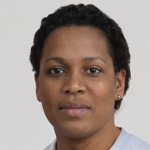 Neutral black young-adult female with short  brown hair and brown eyes