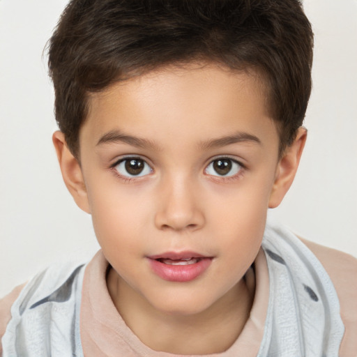 Joyful white child female with short  brown hair and brown eyes