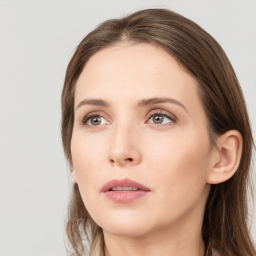 Neutral white young-adult female with long  brown hair and grey eyes