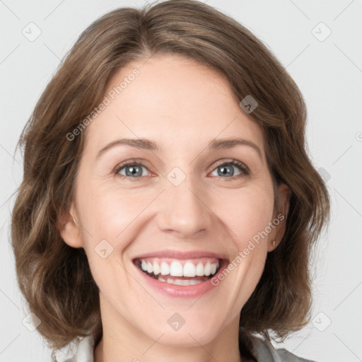 Joyful white young-adult female with medium  brown hair and green eyes